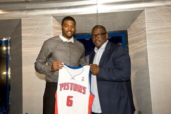 Josh Smith and Detroit president of basketball operations Joe Dumars