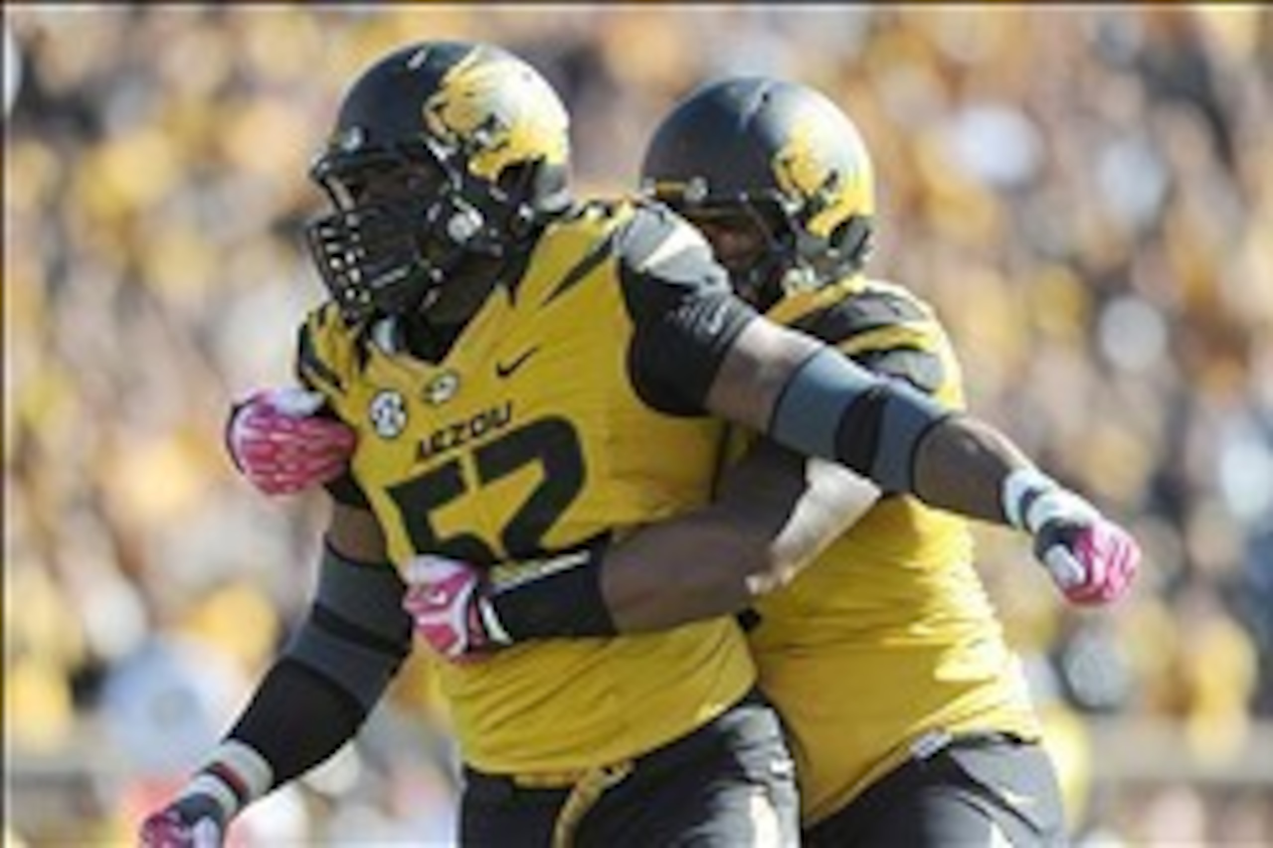 Missouri defensive end Michael Sam (No. 52) is the Tigers' answer to South Carolina's Jadeveon Clowney.