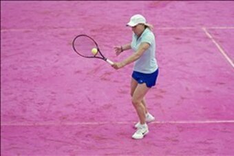 Still carving a lefty backhand, Martina Navratilova, 2012 French Open.