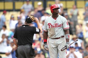 LOS ANGELES, CA - JUNE 30: Ryan Howard #6 of the Philadelphia Phillies  reacts after striking out for the final out of the game with the Los Angeles Dodgers at Dodger Stadium on June 30, 2013 in Los Angeles, California. The Dodgers won 6-1.  (Photo by Ste