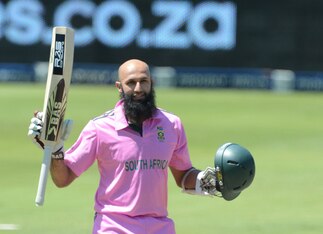 JOHANNESBURG, SOUTH AFRICA - MARCH 17:  Hashim Amla of South Africa celebrates his 100 during the 3rd Momentum ODI match between South Africa and Pakistan at Bidvest Wanderers Stadium on March 17, 2013 in Johannesburg, South Africa. (Photo by Duif du Toit