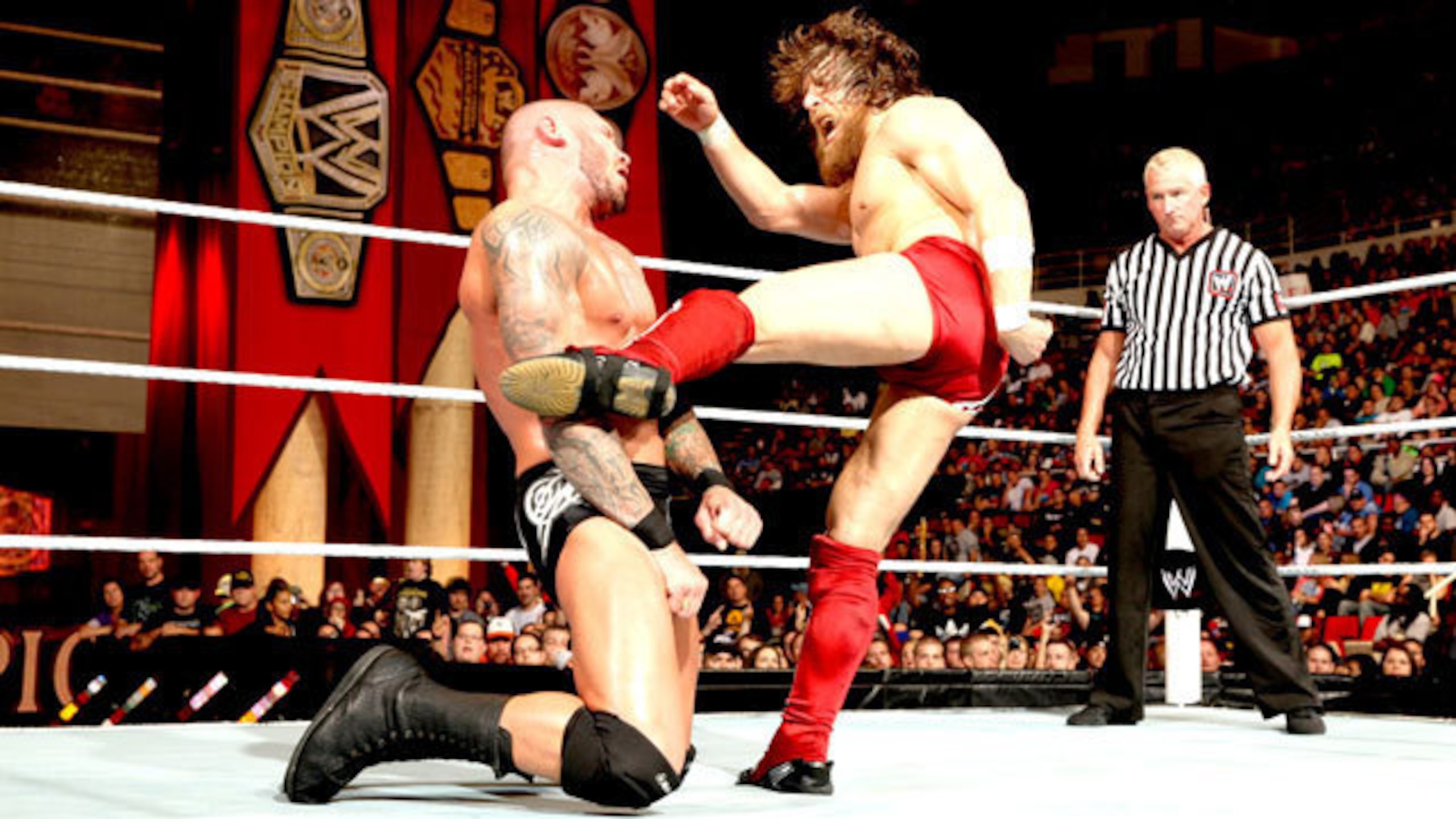 Daniel Bryan delivers a kick to Randy Orton Daniel Bryan delivers a kick to Randy Orton
