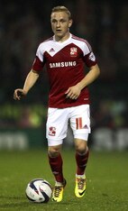 Alex Pritchard playing for Swindon Town