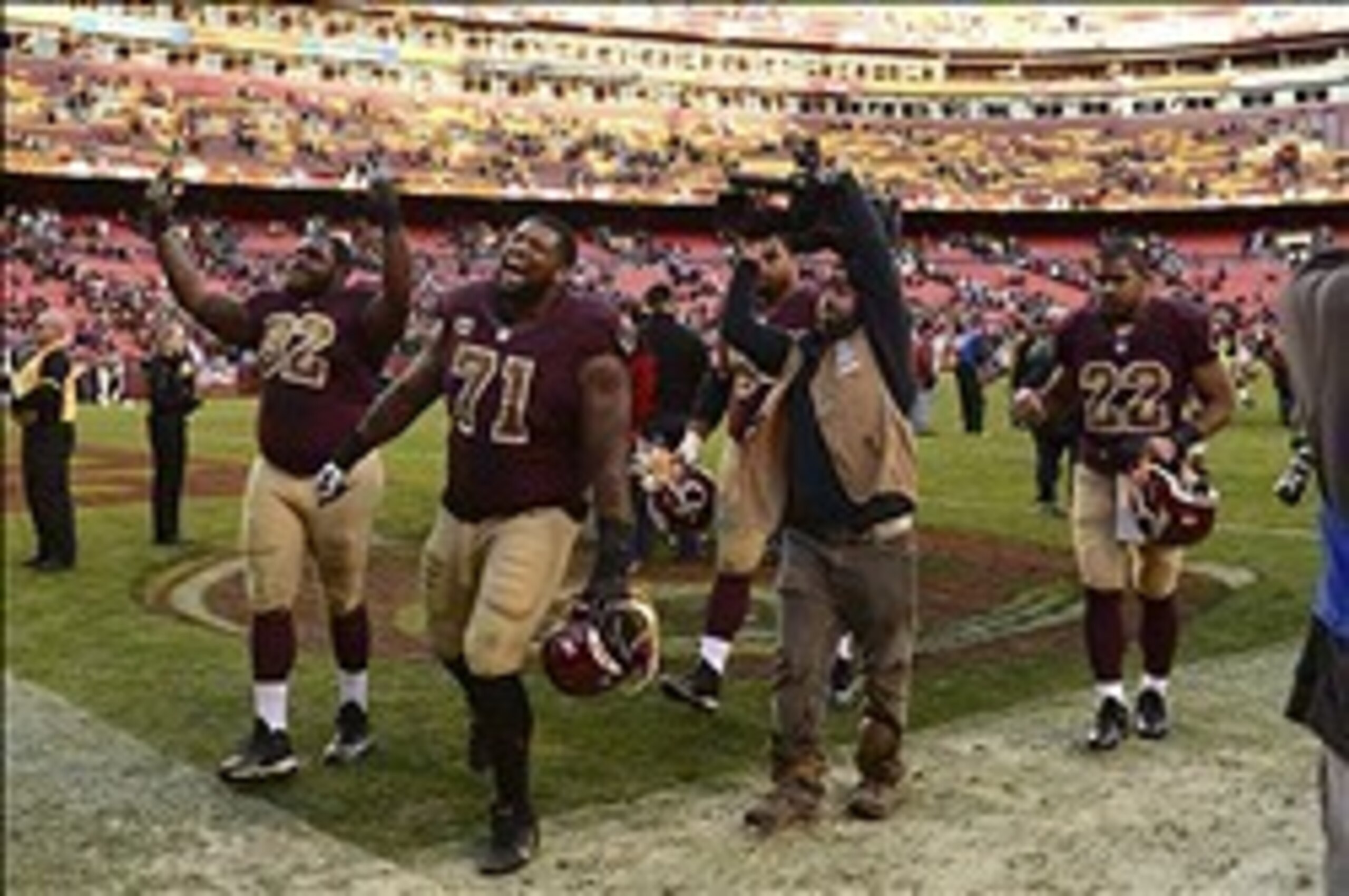 Trent Williams (71) and the rest of the O-line wore down the Chargers defense.