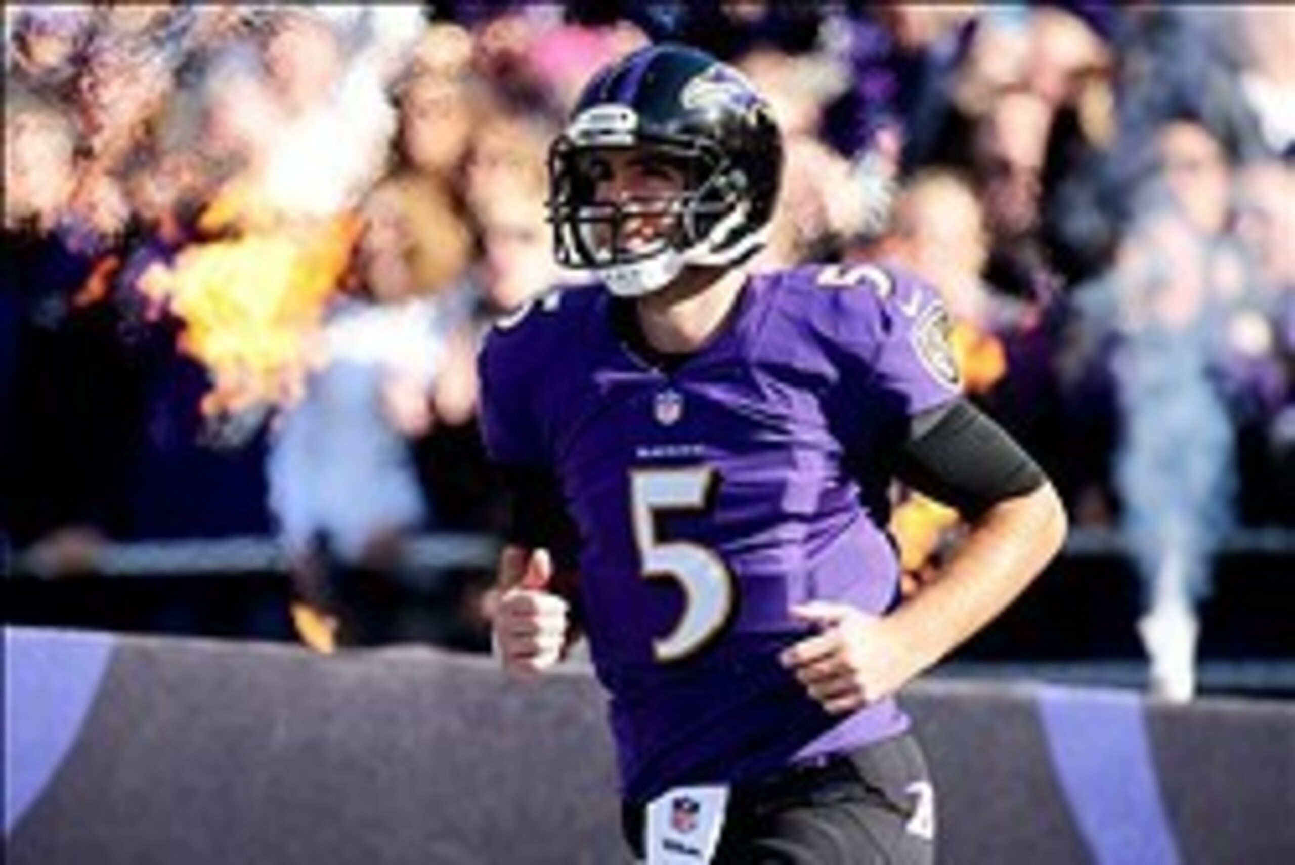 Nov 10, 2013; Baltimore, MD, USA; Baltimore Ravens quarterback Joe Flacco (5) is introduced prior to the game against the Cincinnati Bengals at M&T Bank Stadium. Mandatory Credit: Evan Habeeb-USA TODAY Sports
