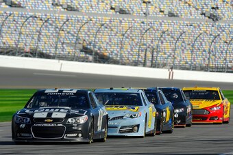 DAYTONA BEACH, FL - JANUARY 10:  The new Generation 6 NASCAR Sprint Cup cars sit on the grid during NASCAR Sprint Cup Series Preseason Thunder testing at Daytona International Speedway on January 10, 2013 in Daytona Beach, Florida.  (Photo by Jared C. Til