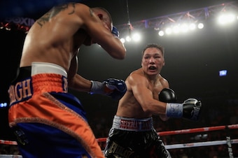 Provodnikov comes forward and throws punches.