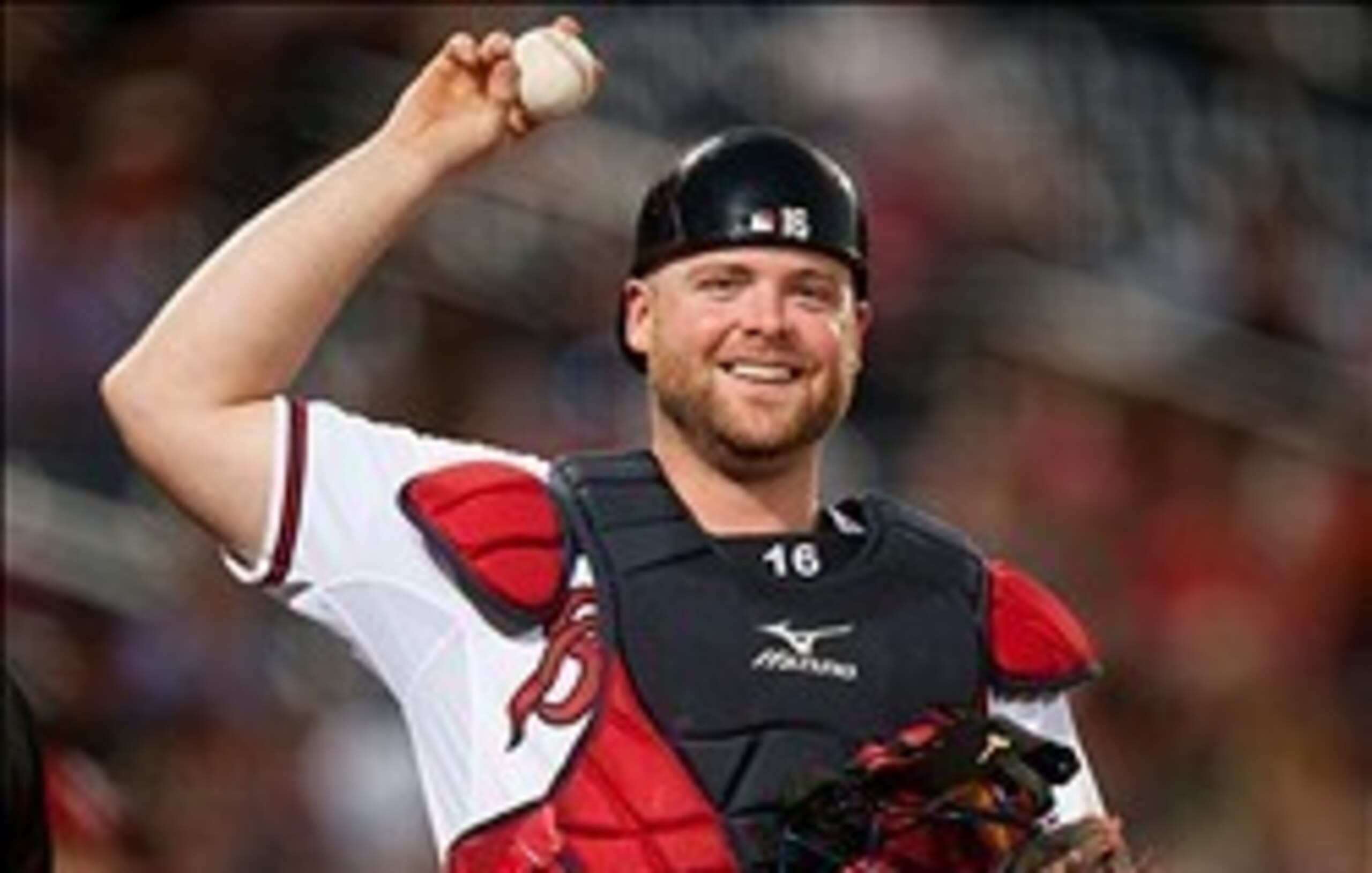 Aug 13, 2013; Atlanta, GA, USA; Atlanta Braves catcher Brian McCann (16) smiles during the game against the Philadelphia Phillies at Turner Field. Mandatory Credit: Kevin Liles-USA TODAY Sports