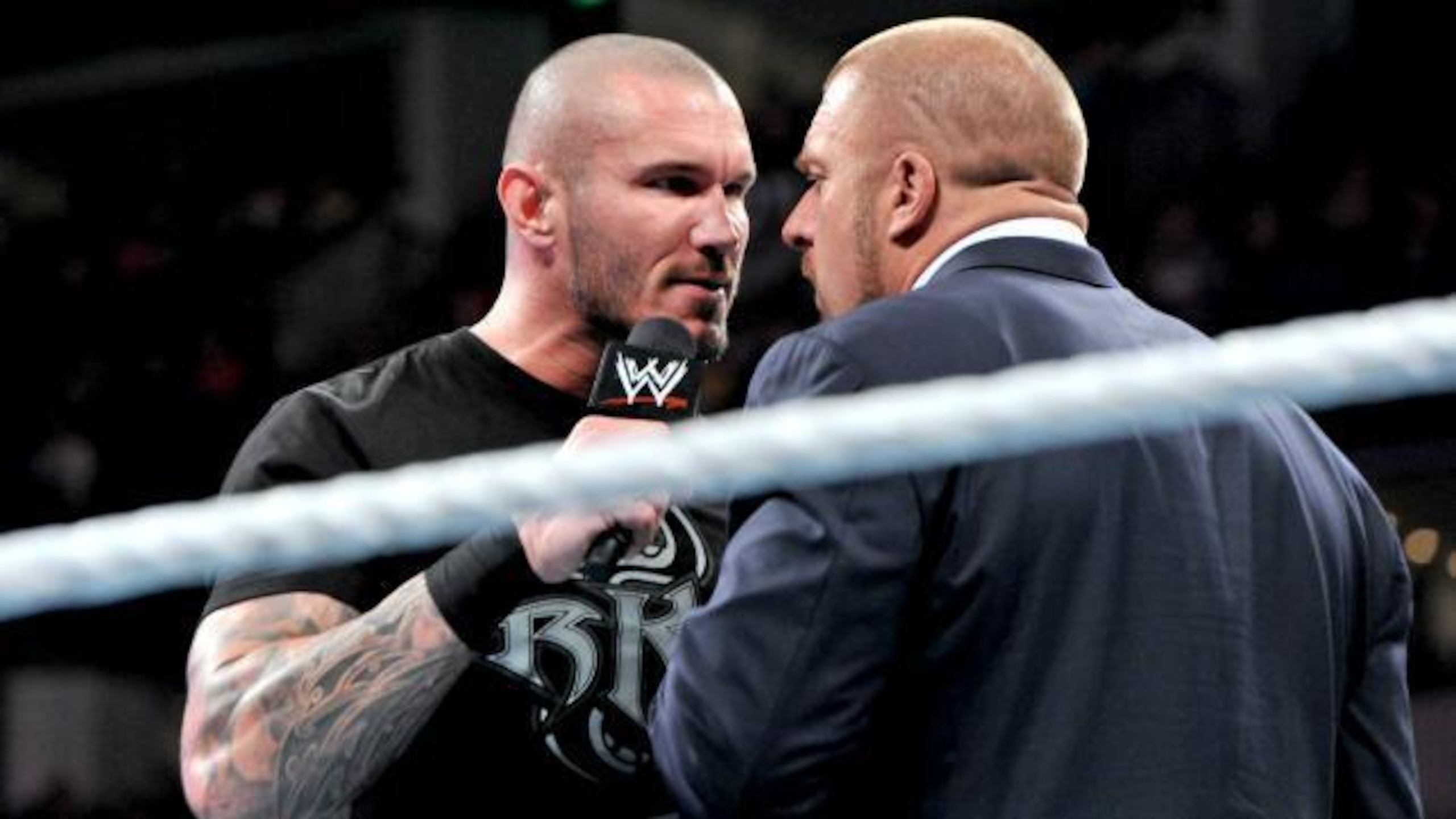 Triple H and Randy Orton exchange harsh words during Raw.