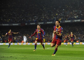 Xavi opened the scoring in an El Clasico match that had many lauding Barcelona's performance as the best ever by a club side.