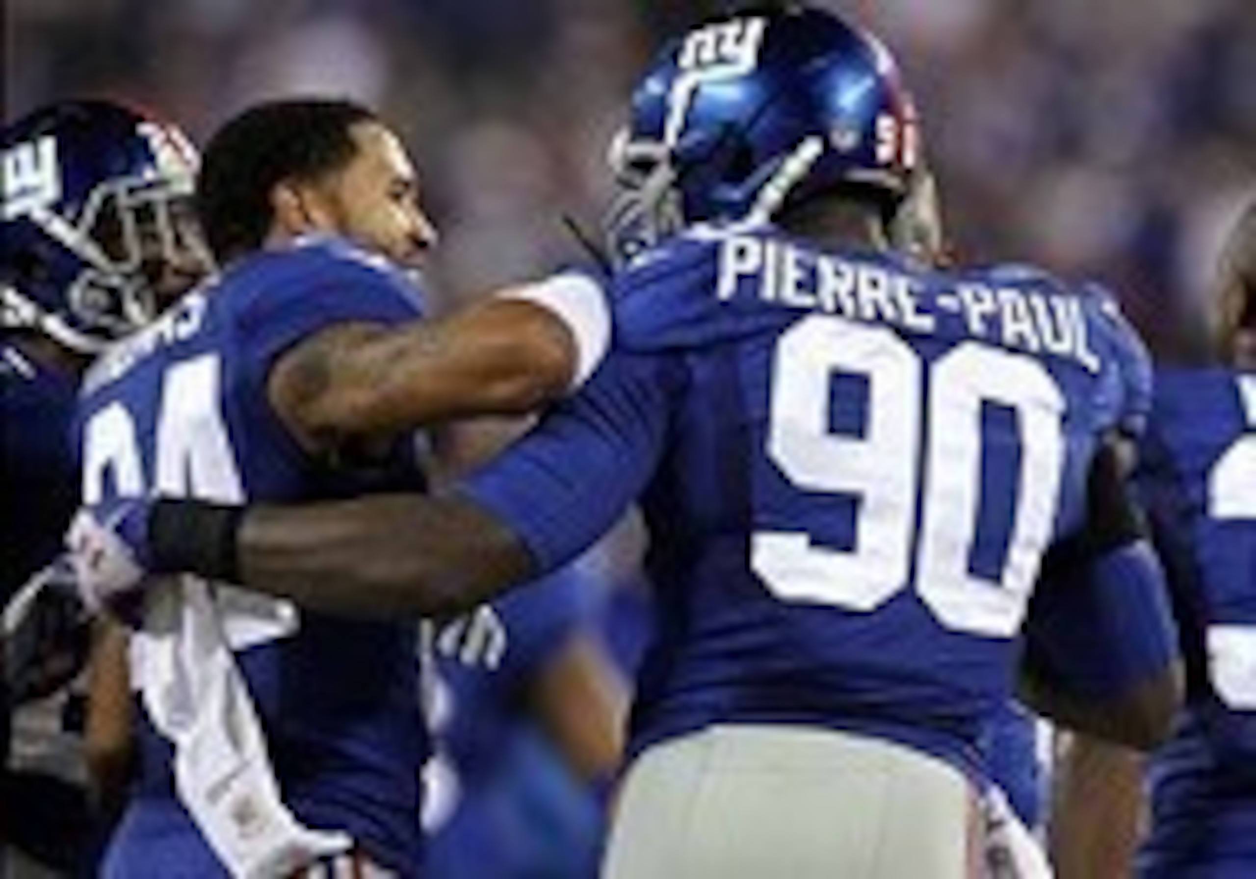Thomas, left, and Pierre-Paul were cocky this week.