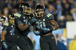 Caleb Benenoch (left)