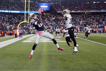 FOXBORO, MA - OCTOBER 13:  Wide receiver Kenbrell Thompkins #85 of the New England Patriots catches the game winning touchdown in front of cornerback Jabari Greer #33 of the New Orleans Saints in the closing seconds of the Patriots 30-27 win at Gillette S