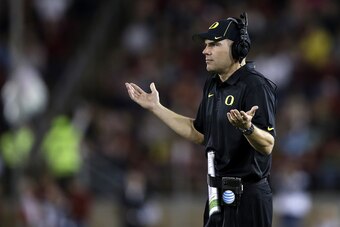 PALO ALTO, CA - NOVEMBER 07:  Head coach Mark Helfrich of the Oregon Ducks reacts in the first half while taking on the Stanford Cardinal at Stanford Stadium on November 7, 2013 in Palo Alto, California.  (Photo by Ezra Shaw/Getty Images)
