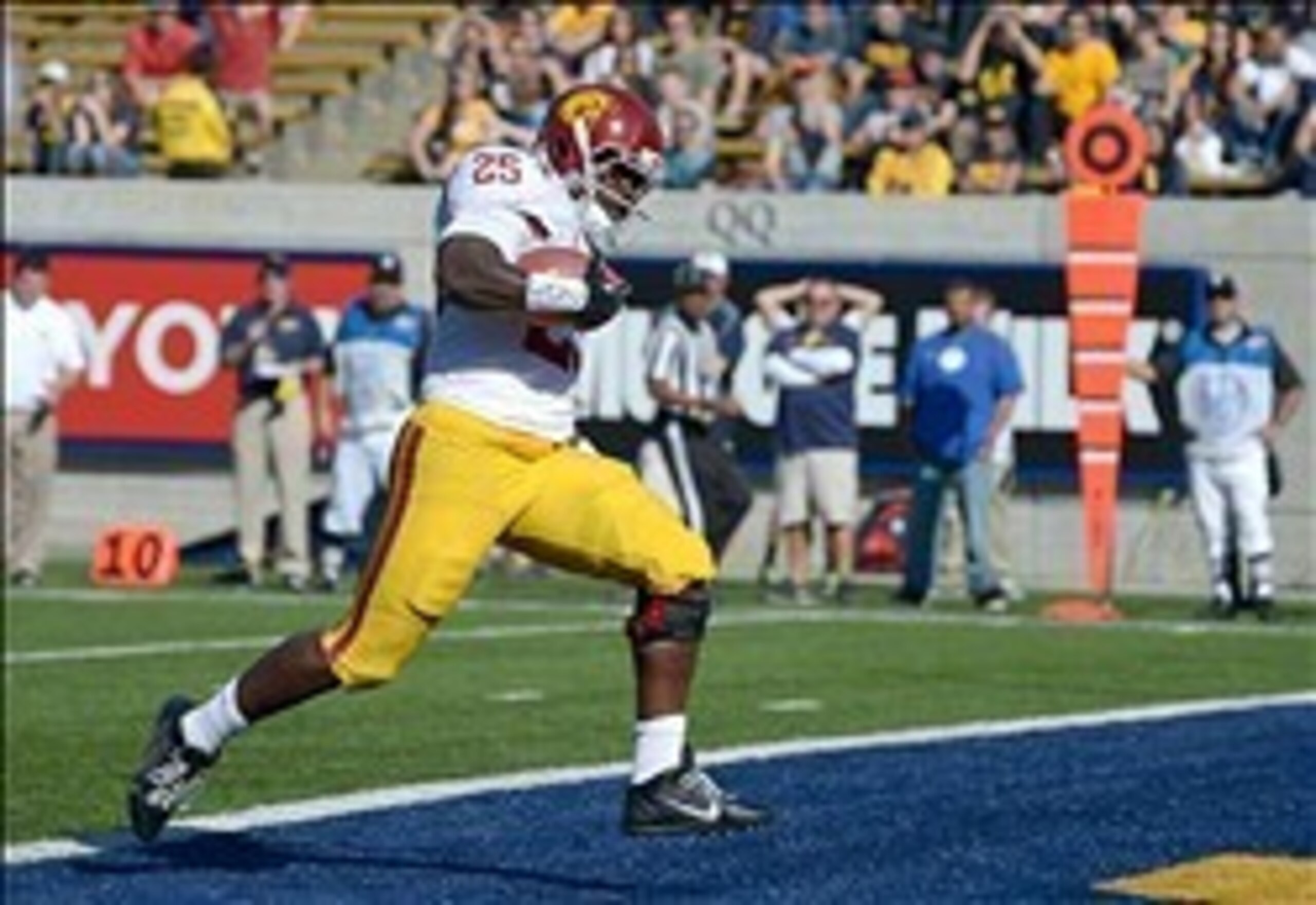 Nov 9, 2013; Berkeley, CA, USA; Southern California Trojans tailback Silas Redd (25) scores on a 12-yard touchdown reception against the California Golden Bears at Memorial Stadium. Mandatory Credit: Kirby Lee-USA TODAY Sports