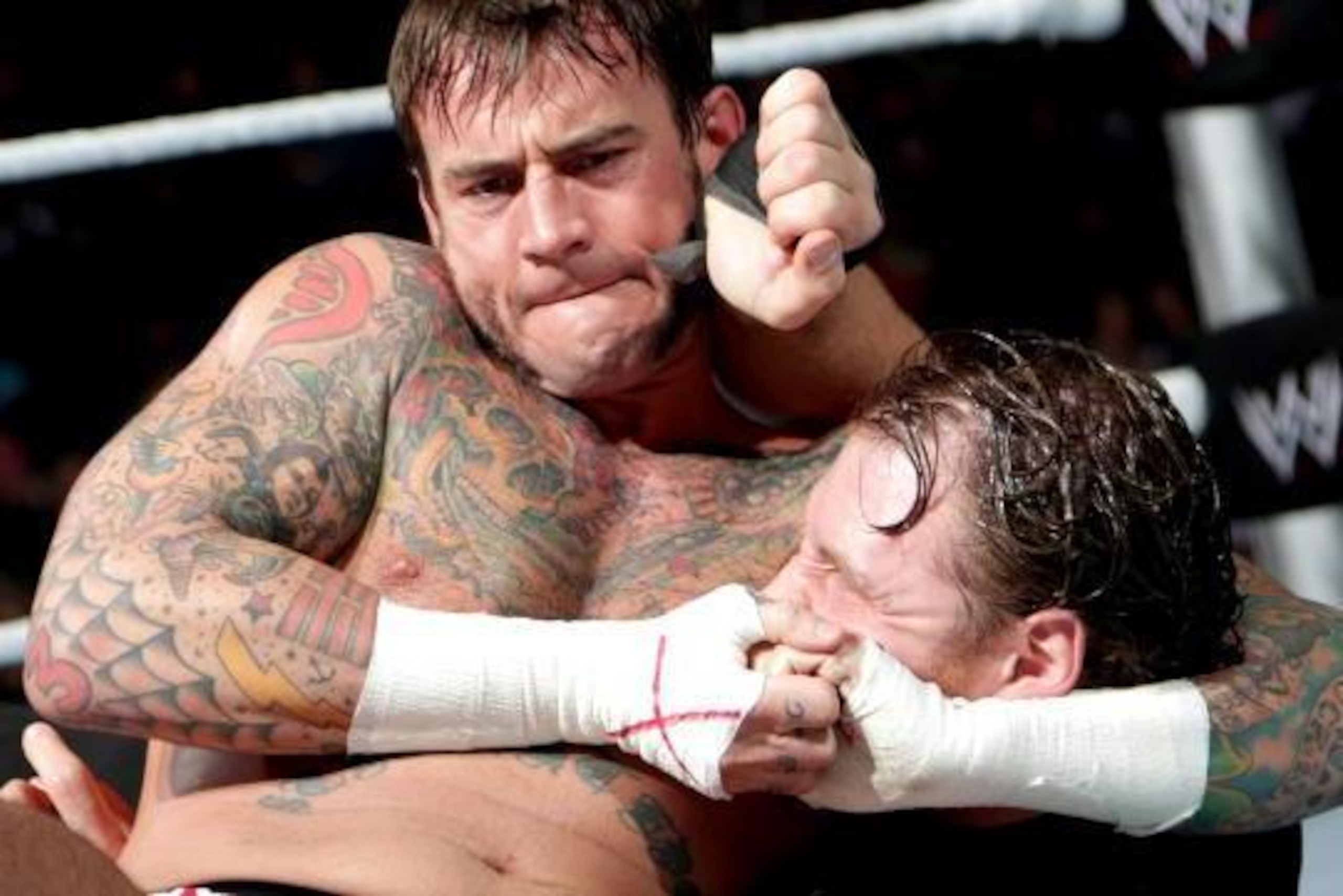 CM Punk takes hold of United States champion Dean Ambrose on SmackDown.