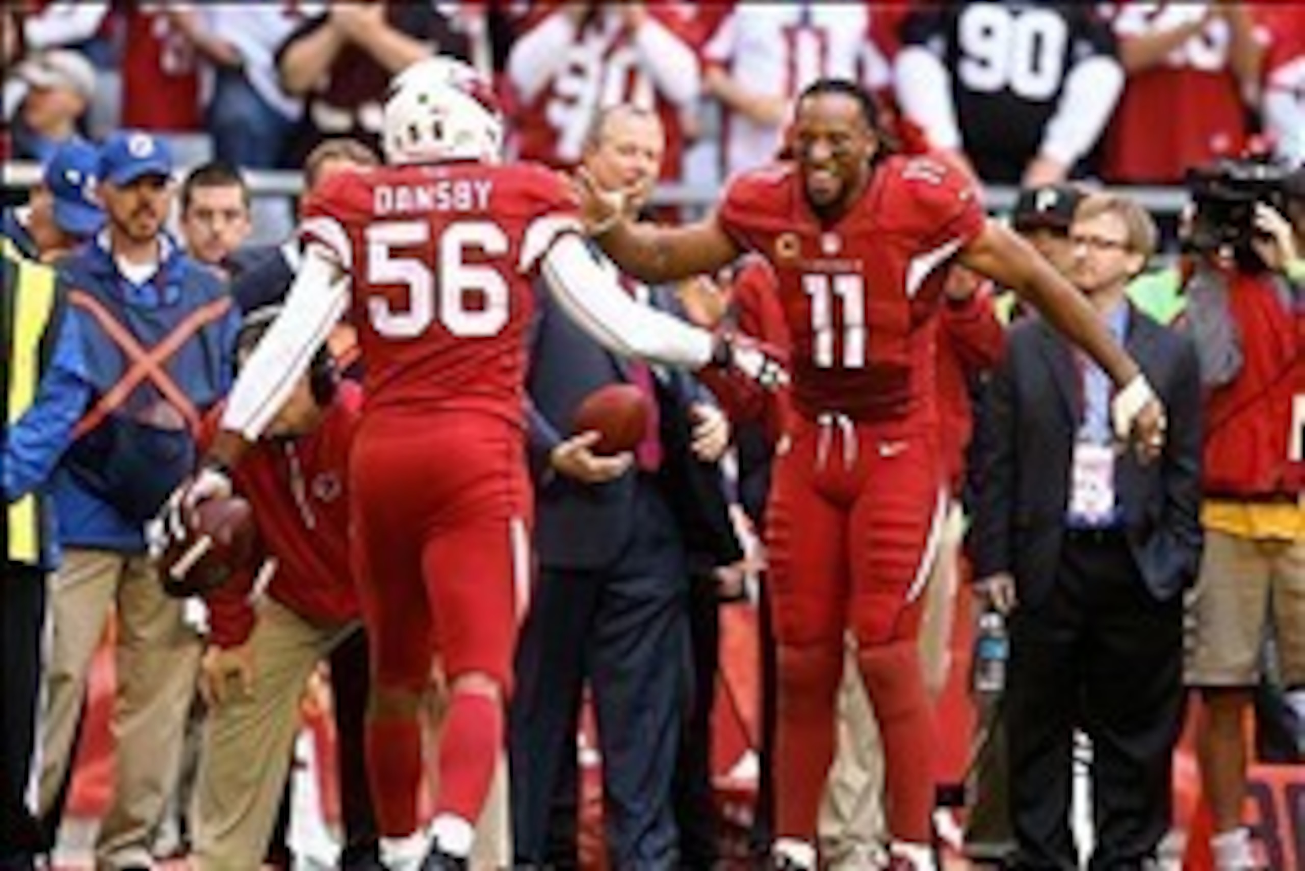Karlos Dansby (56) and Larry Fitzgerald (11) were both instrumental in Sunday's win.