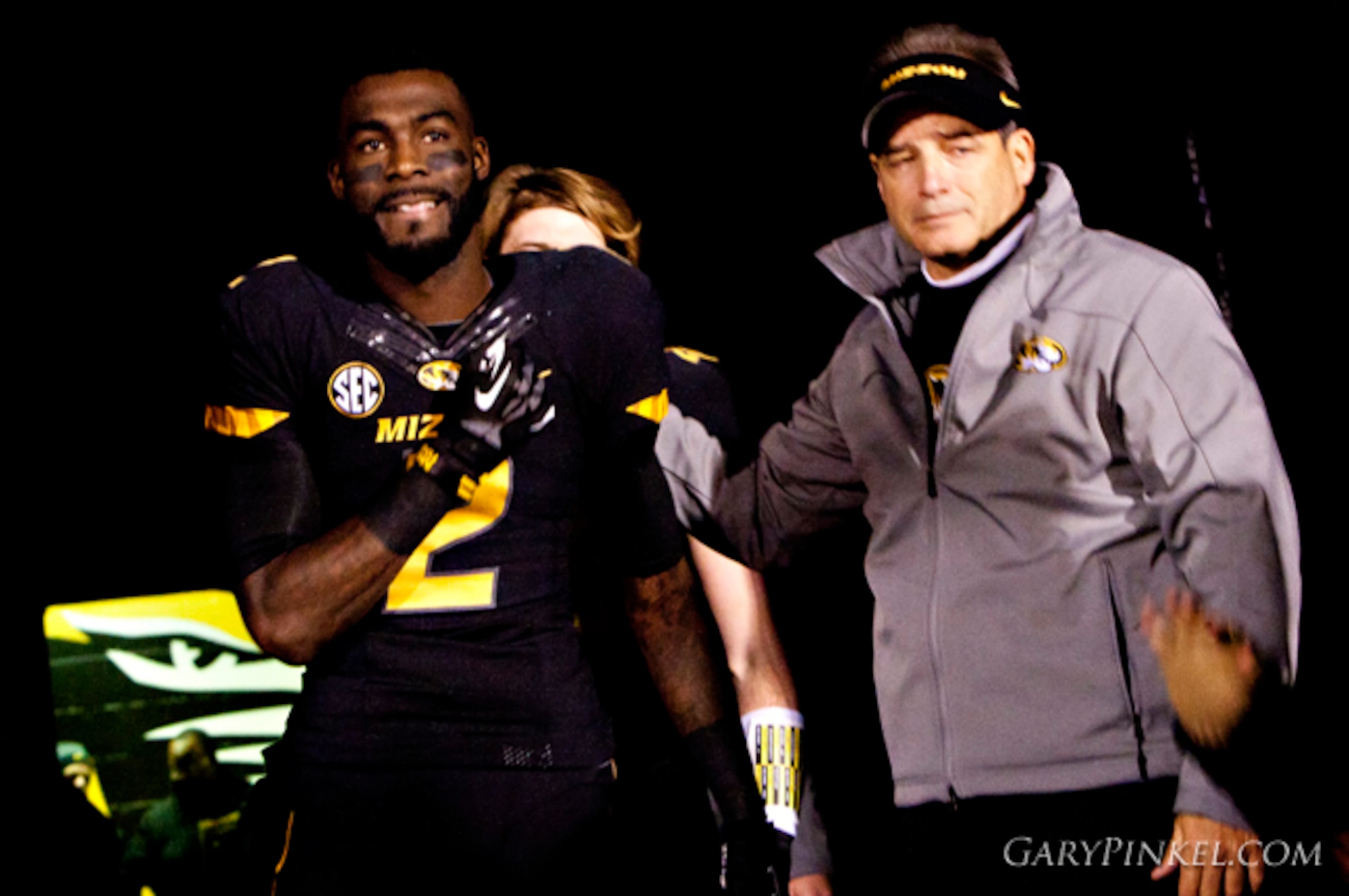 Senior wide receiver L'Damian Washington prepares talk walk out onto Faurot Field for the final time with Coach Gary Pinkel.