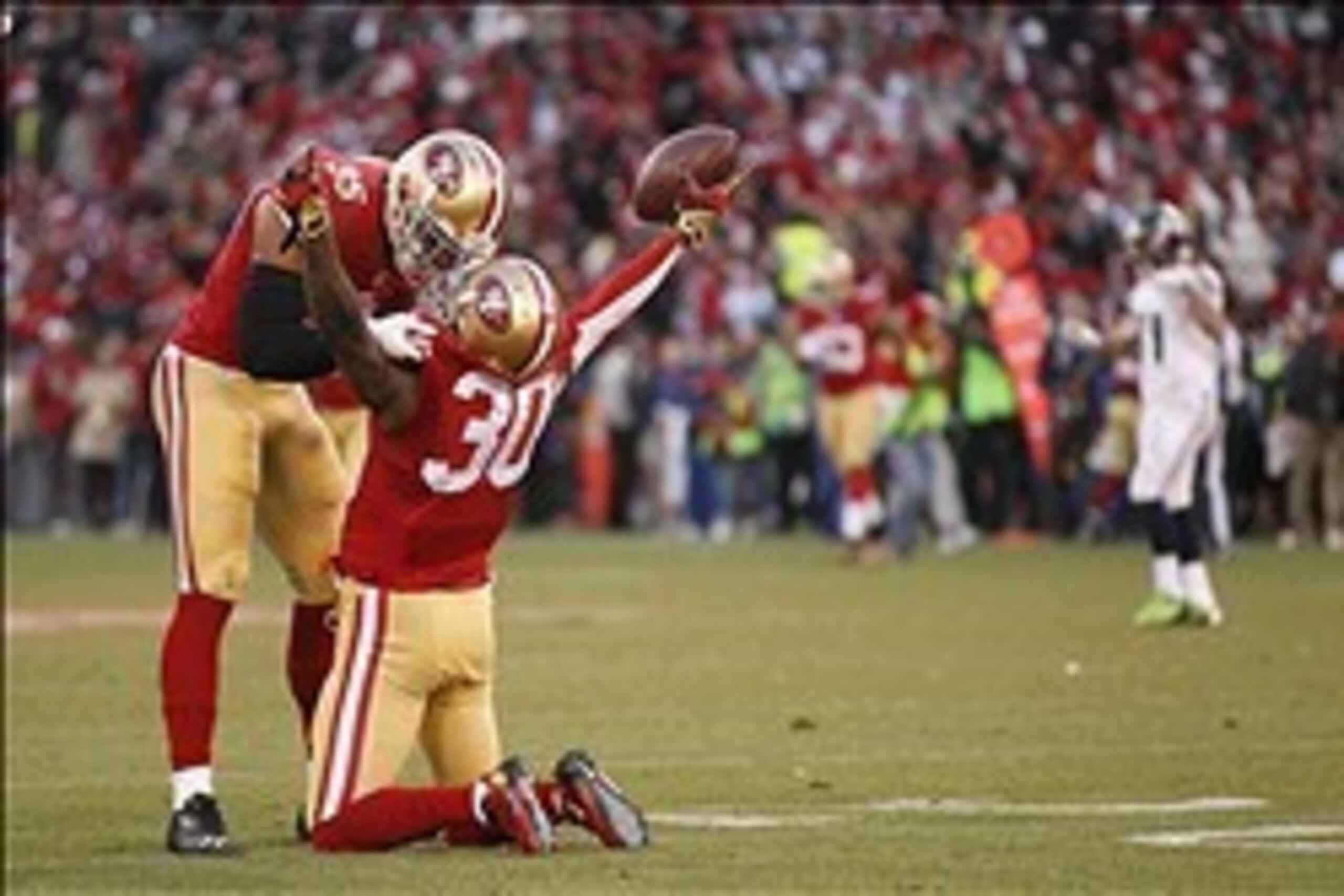 Eric Wright celebrates with the game-sealing interception.