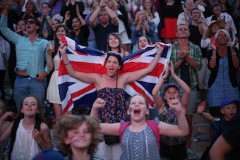 LONDON, ENGLAND - JULY 05:  Spectators celebrate Andy Murray of Great Britain's win in the men's singles semi final match against Jerzy Janowicz of Poland on day eleven of the Wimbledon Lawn Tennis Championships at the All England Lawn Tennis and Croquet 