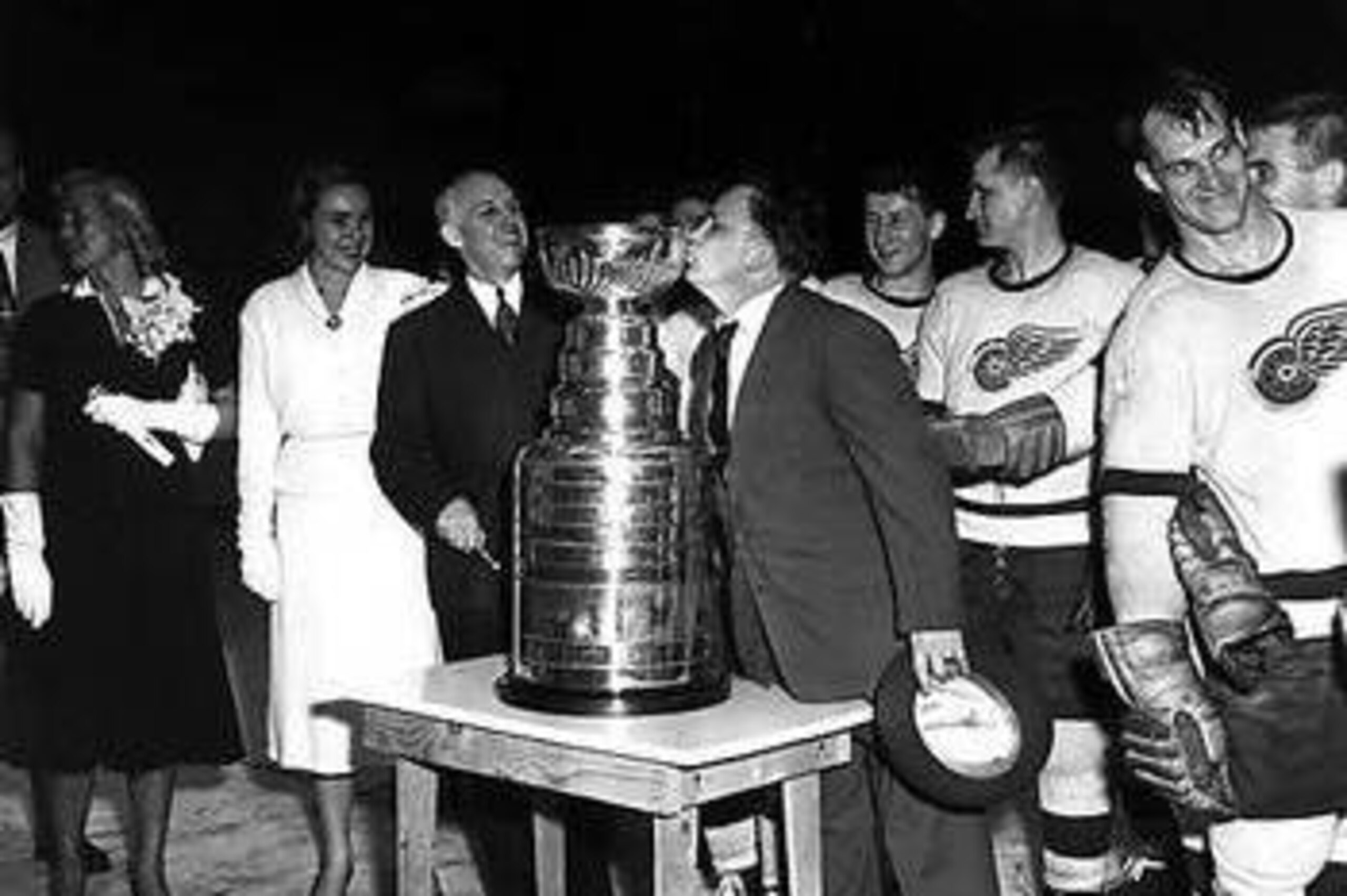Jimmy Skinner kisses the Cup after Game 7 of the 1955 Stanley Cup Final.