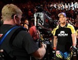 Feb 23, 2013; Anaheim, CA, USA; Lyoto Machida (red gloves) enters the ring to fight Dan Henderson (not pictured) during the UFC welterweight bout at the Honda Center. Mandatory Credit: Jayne Kamin-Oncea-USA TODAY Sports
