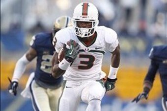 Nov 29, 2013; Pittsburgh, PA, USA; Miami Hurricanes wide receiver Stacy Coley (3) runs after a pass reception to score a thirty-four yard touchdown against the Pittsburgh Panthers during the first quarter at Heinz Field. Mandatory Credit: Charles LeClaire