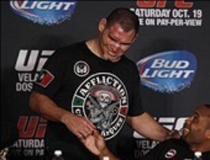 Oct 19, 2013; Houston, TX, USA; Cain Velasquez (left) shakes hands with Daniel Cormier (right) during the press conference following UFC 166 at Toyota Center. Mandatory Credit: Andrew Richardson-USA TODAY Sports
