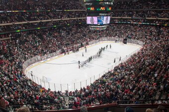 ST. PAUL, MN - MAY 13: The Minnesota Wild and Chicago Blackhawks shake hands following Game Six of the Second Round of the 2014 Stanley Cup Playoffs on May 13, 2014 at the Xcel Energy Center in St. Paul, Minnesota. (Photo by Bruce Kluckhohn/NHLI via Getty