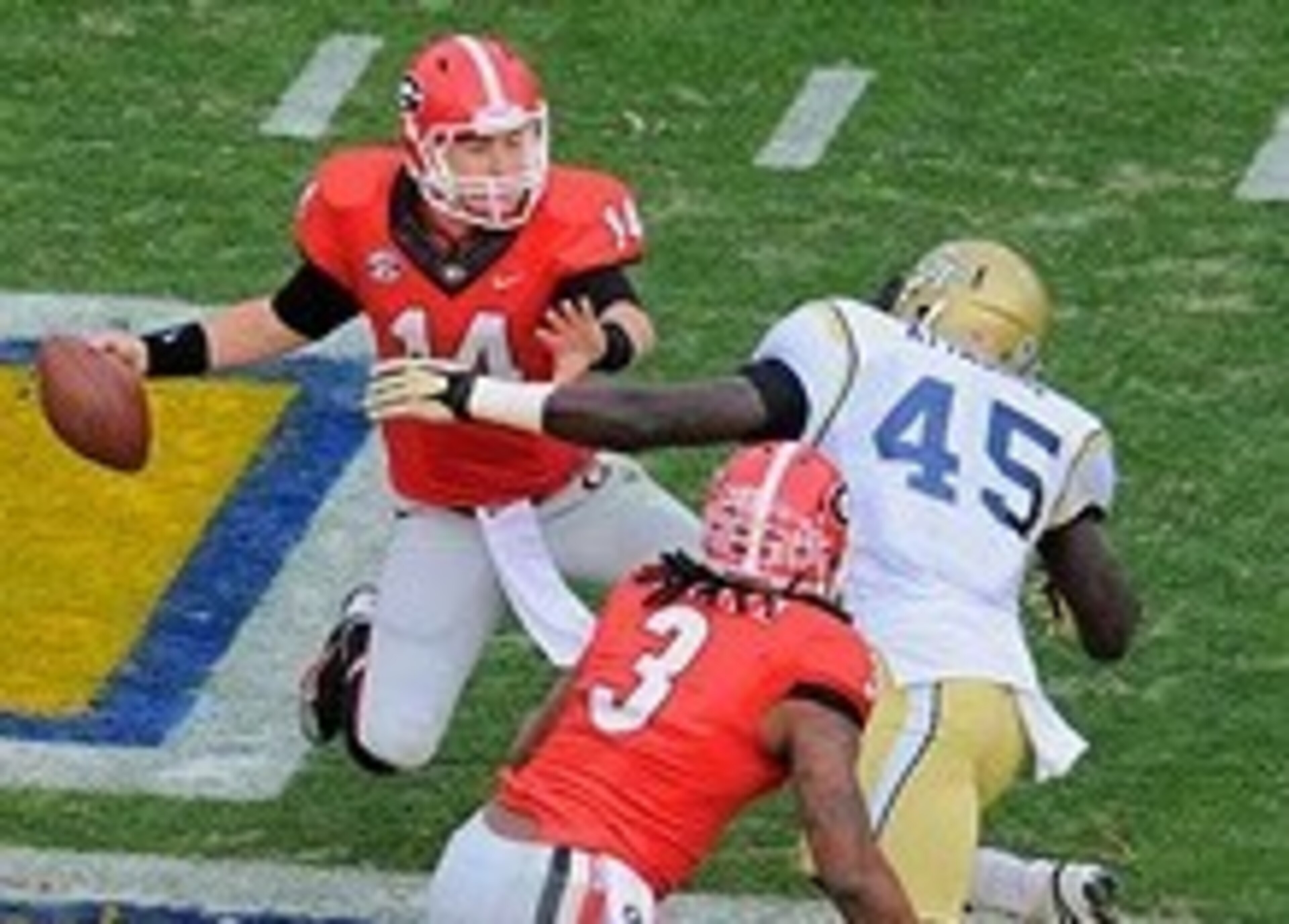 Nov 30, 2013; Atlanta, GA, USA; Georgia Tech Yellow Jackets defensive end Jeremiah Attaochu (45) sacks Georgia Bulldogs quarterback Hutson Mason (14) during the first quarter at Bobby Dodd Stadium. Mandatory Credit: Dale Zanine-USA TODAY Sports