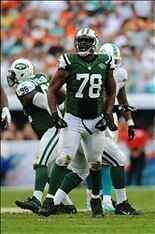 Dec 29, 2013; Miami Gardens, FL, USA; New York Jets defensive tackle Leger Douzable (78) reacts during a game against the Miami Dolphins at Sun Life Stadium. Mandatory Credit: Steve Mitchell-USA TODAY Sports