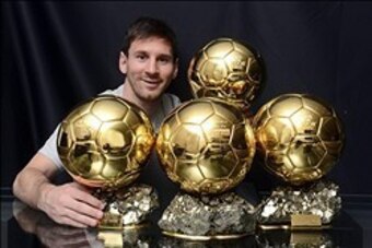 Smiles better: FC Barcelona playmaker Lionel Messi celebrates with his four FIFA Ballon d'Or trophies