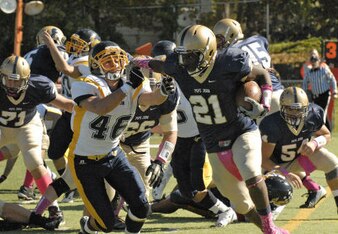 Ohio State commit Noah Brown carries the ball.