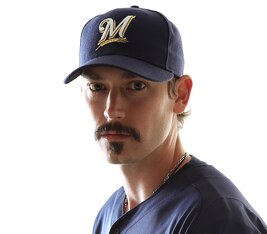 MARYVALE, AZ - FEBRUARY 24:  John Axford #59 of the Milwaukee Brewers poses for a portrait during Spring Training Media Day on February 24, 2011 at Maryvale Stadium in Maryvale, Arizona.  (Photo by Jonathan Ferrey/Getty Images)