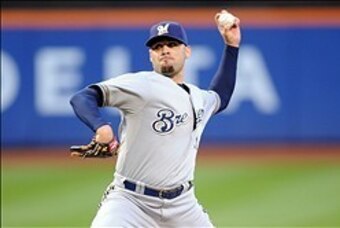 Sep 28, 2013; New York, NY, USA; Milwaukee Brewers relief pitcher Mike Gonzalez (51) throws a pitch against the New York Mets at Citi Field. Mandatory Credit: Joe Camporeale-USA TODAY Sports