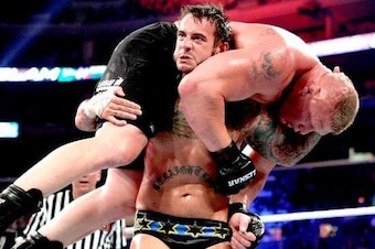 CM Punk prepares to connect with the GTS onto Brock Lesnar.