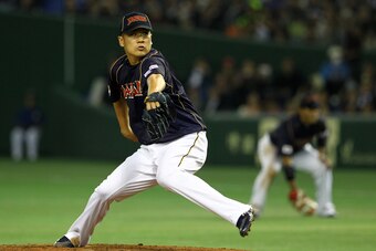 Which team will capture the top remaining prize on the free-agent market in Japanese pitcher Masahiro Tanaka?