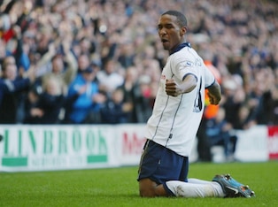 Defoe celebrates the first of many goals at White Hart Lane.