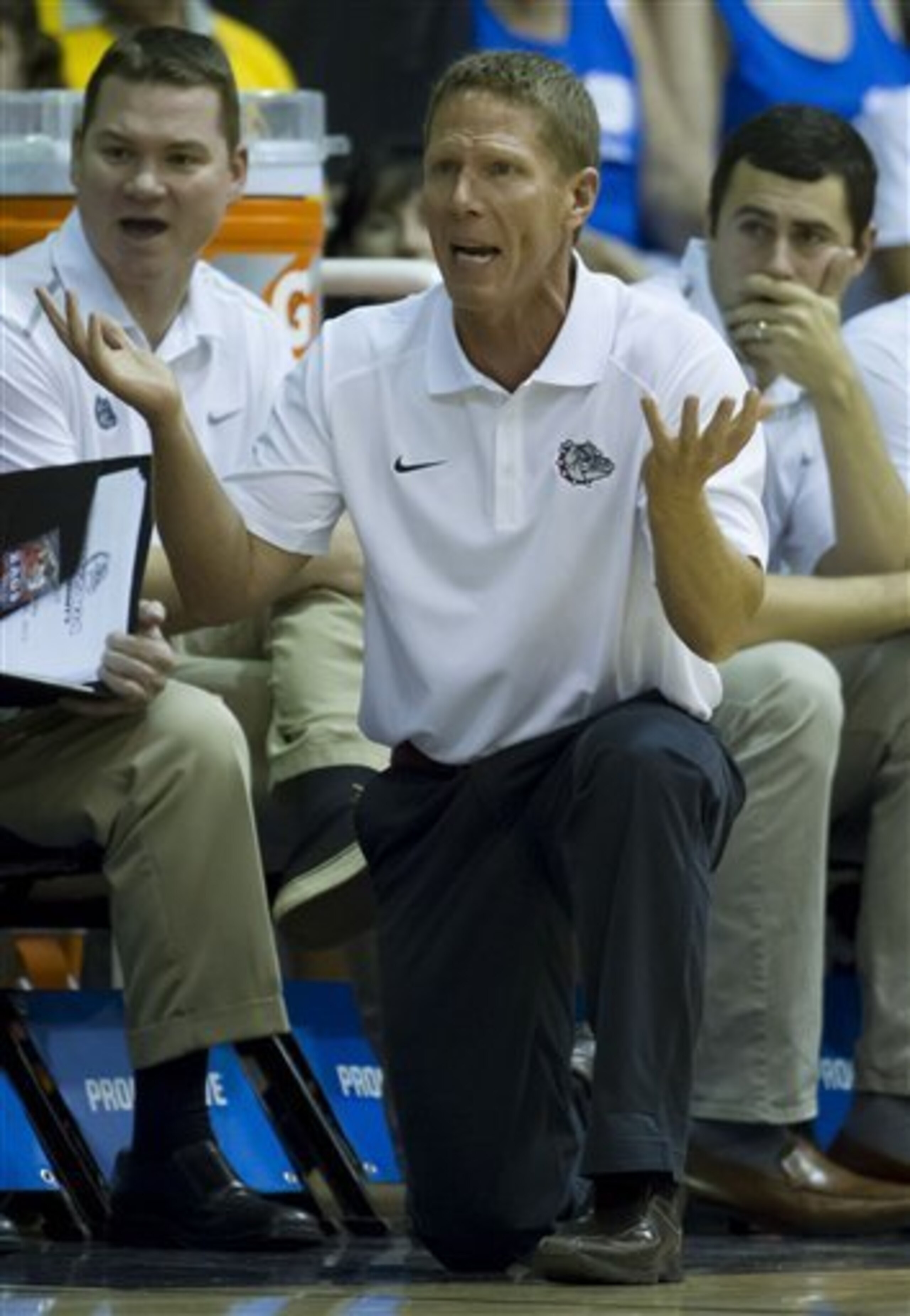 Gonzaga head coach Mark Few watches his team play Arkansas in the first half of an NCAA college basketball game at the Maui Invitational on Wednesday, Nov. 27, 2013, in Lahaina, Hawaii. (AP Photo/Eugene Tanner)
