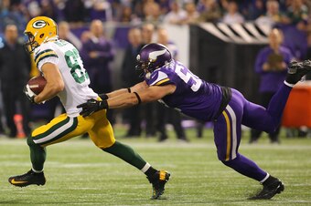 Chad Greenway attempts to corral Jordy Nelson in Week 8 against the Green Bay Packers.