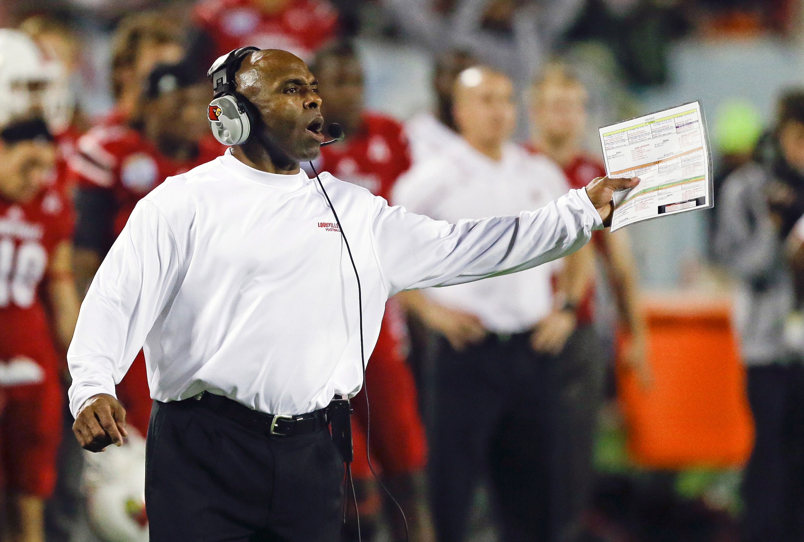 Texas' Charlie Strong highlights the high-profile college coaching carousel that had no room for Orgeron. Texas' Charlie Strong highlights the high-profile college coaching carousel that had no room for Orgeron.