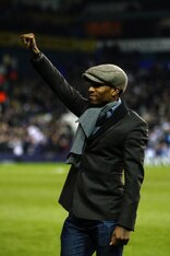 Defoe salutes the White Hart Lane crowd during a Carling Cup semifinal with Burnley.