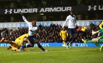 Defoe fires past Speroni to seal Spurs' 2-0 win over Crystal Palace.
