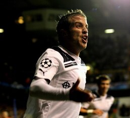 Rafael van der Vaart celebrates scoring against Internazionale in the Champions League.