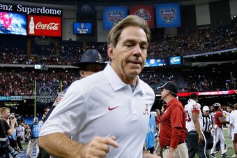NEW ORLEANS, LA - JANUARY 02:  Nick Saban, head coach of the Alabama Crimson Tide runs off the field after being defeated by the Oklahoma Sooners 45-31 during the Allstate Sugar Bowl at the Mercedes-Benz Superdome on January 2, 2014 in New Orleans, Louisi