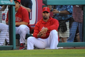 Albert Pujols can't be a spectator in 2014.