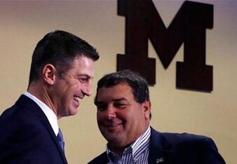 New offensive coordinator Doug Nussmeier with Brady Hoke