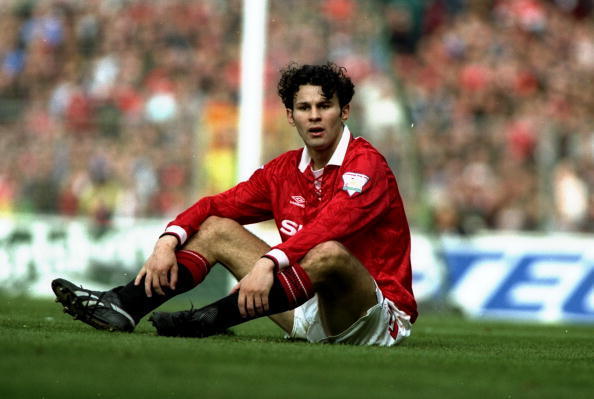 10 Apr 1994:  Ryan Giggs of Manchester United sits on the pitch during the FA Cup semi-final against Oldham Athletic at WEembley Stadium in London, England.  \ Mandatory Credit: Mike  Cooper/Allsport