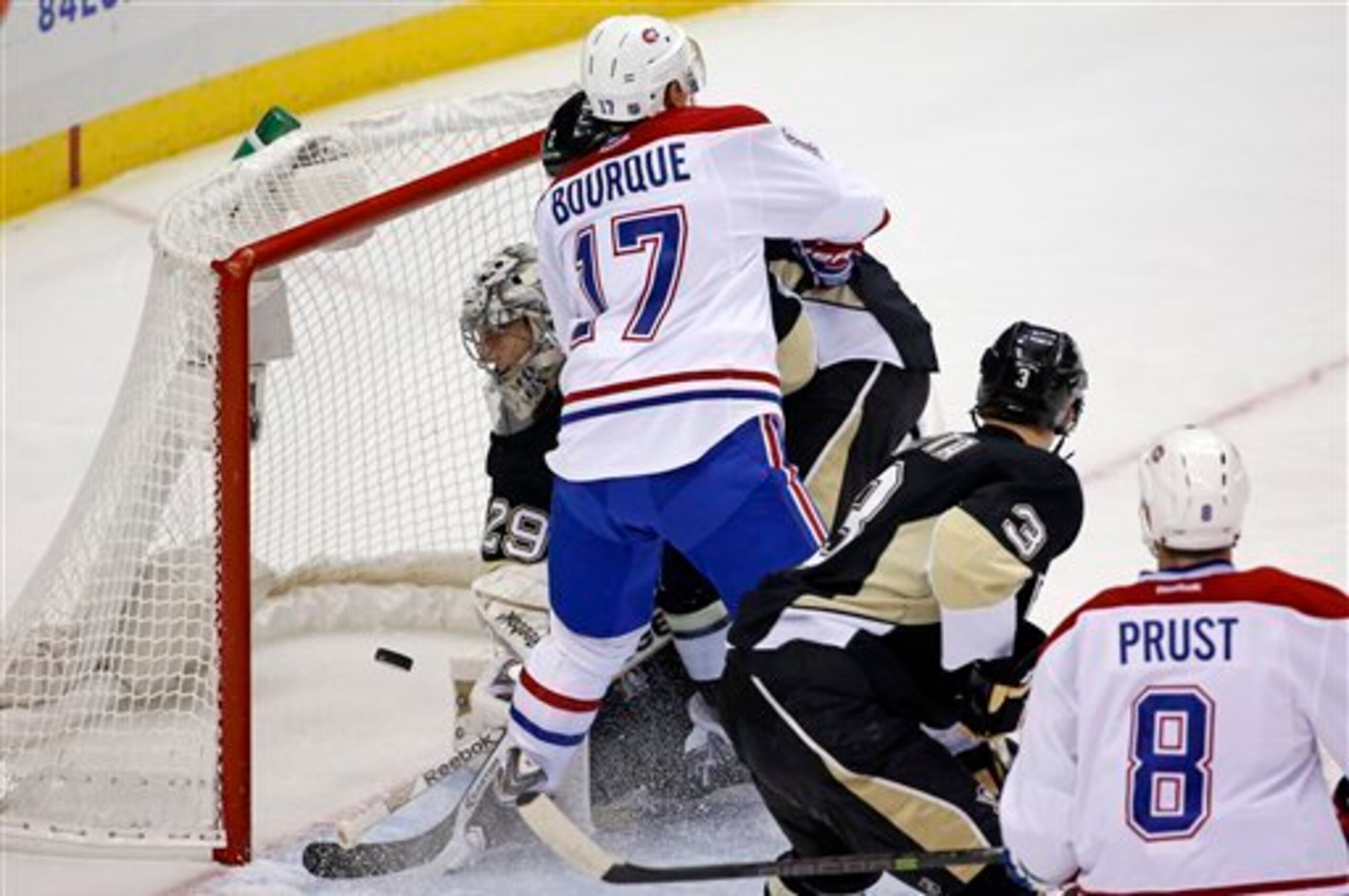 Montreal Canadiens forward Rene Bourque scores against the Pittsburgh Penguins.
