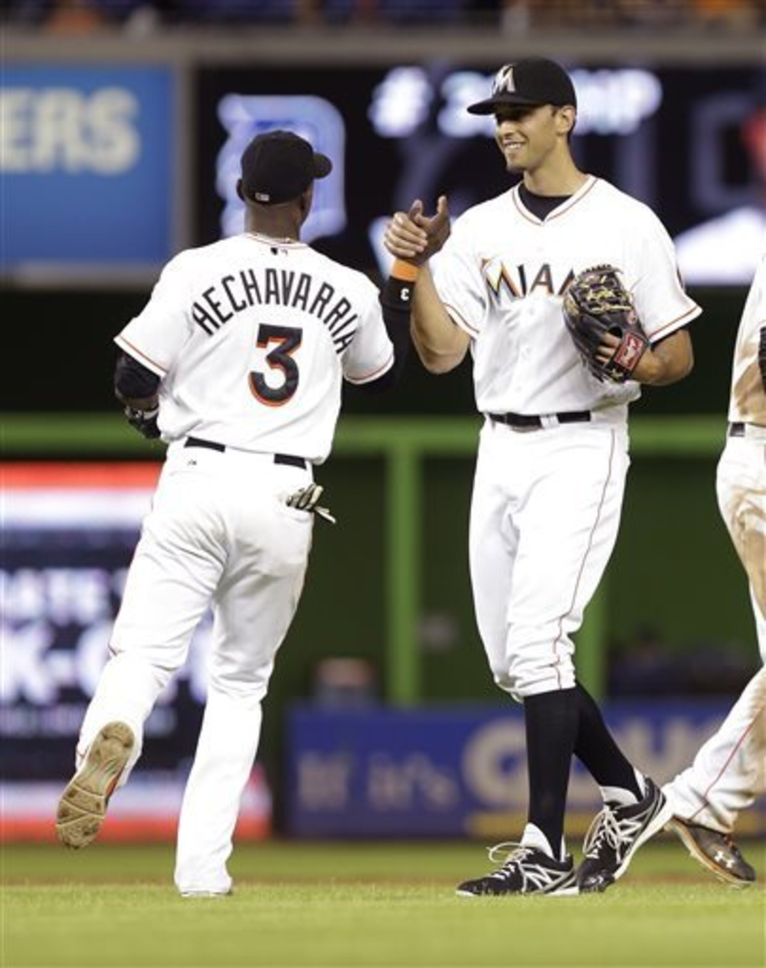 Steve Cishek, right, will look to receive more high-fives after closing out Marlins victories in 2014.